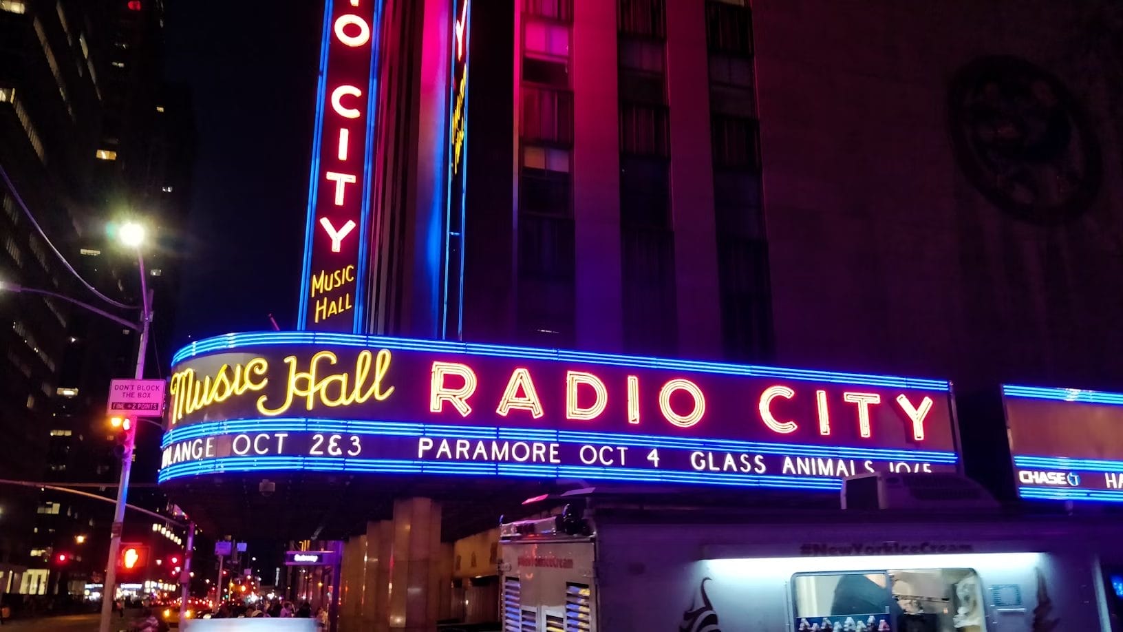 The Radio City Music Hall sign at night - NYC tours