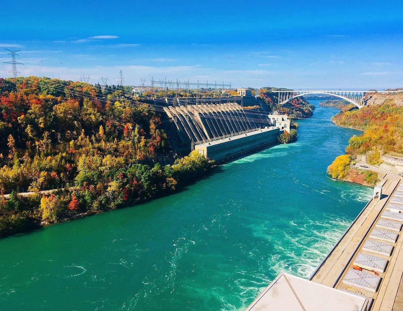 Aerial view of Niagara Falls, showcasing the stunning waterfalls and lush surroundings in Lewiston, New York.