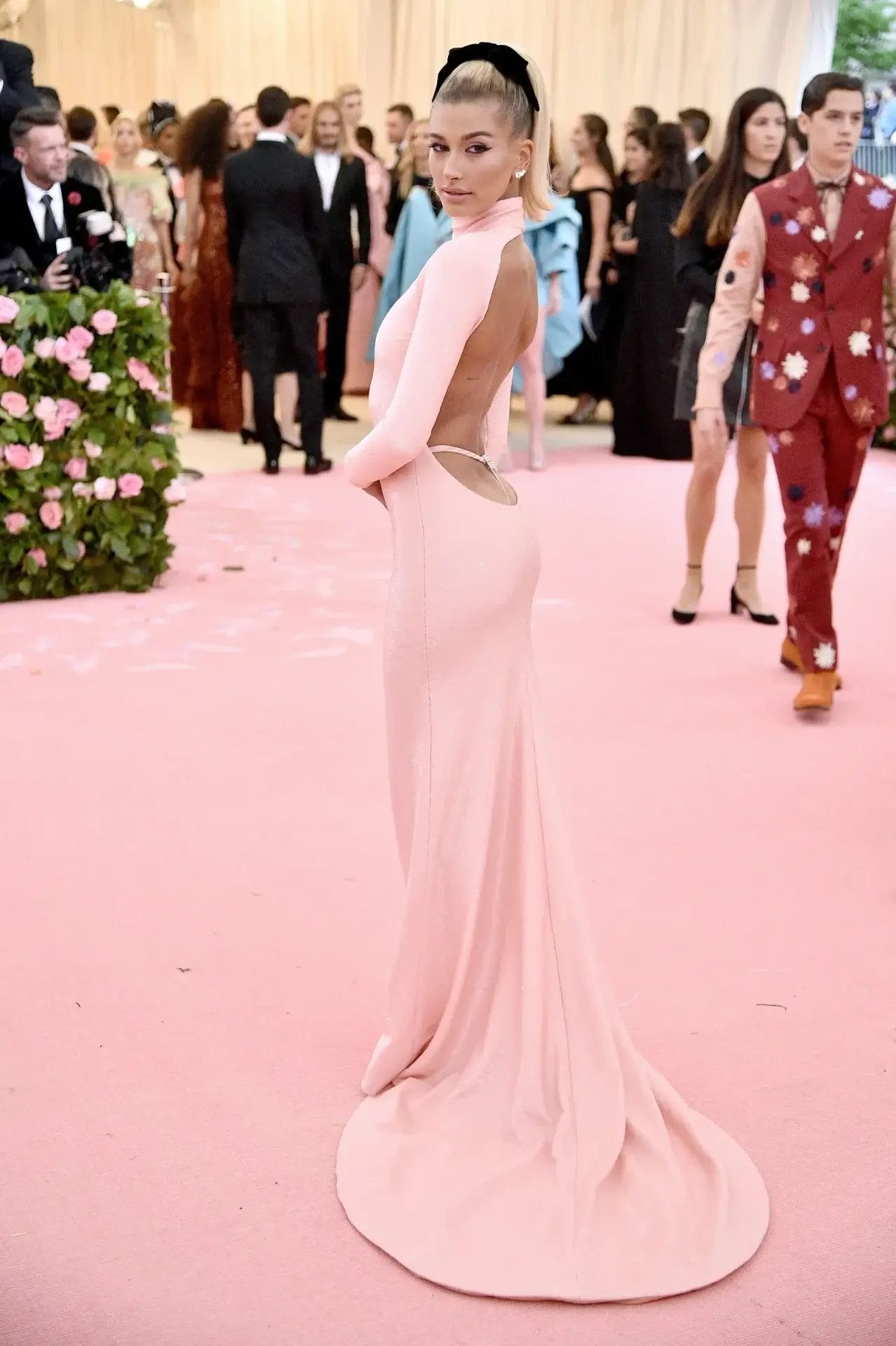 Cheeky! Hailey Baldwin flashed her designer thong at the 2019 Met Gala in New York on Monday in a simple yet daring Alexander Wang pink dress