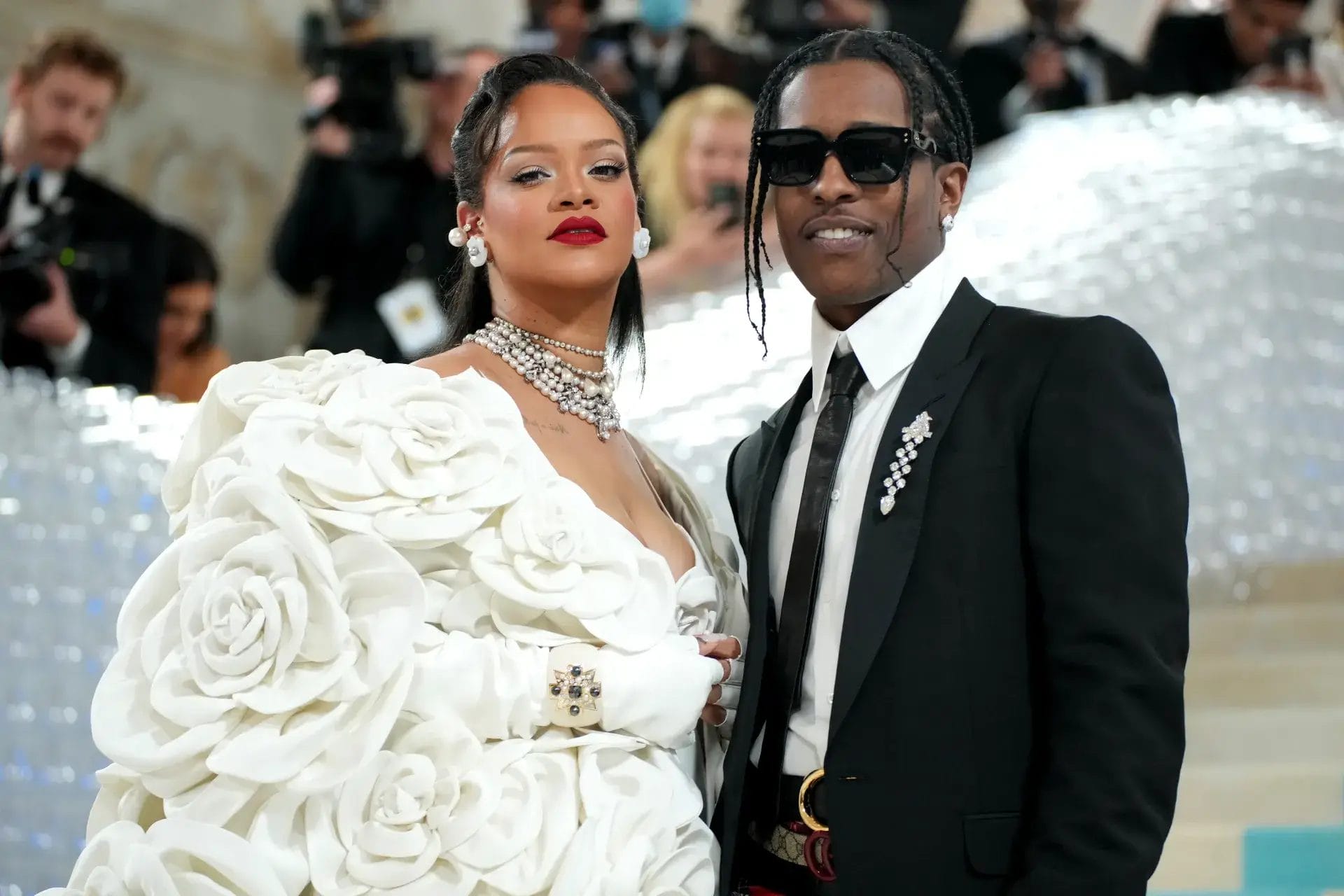 Image may contain AAP Rocky Rihanna Adult Person Wedding Accessories Glasses Formal Wear Tie Blazer and Clothing. Met Gala 2025 confirmed celebrities