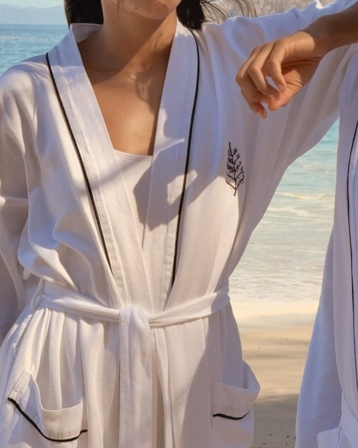 A woman in a white robe