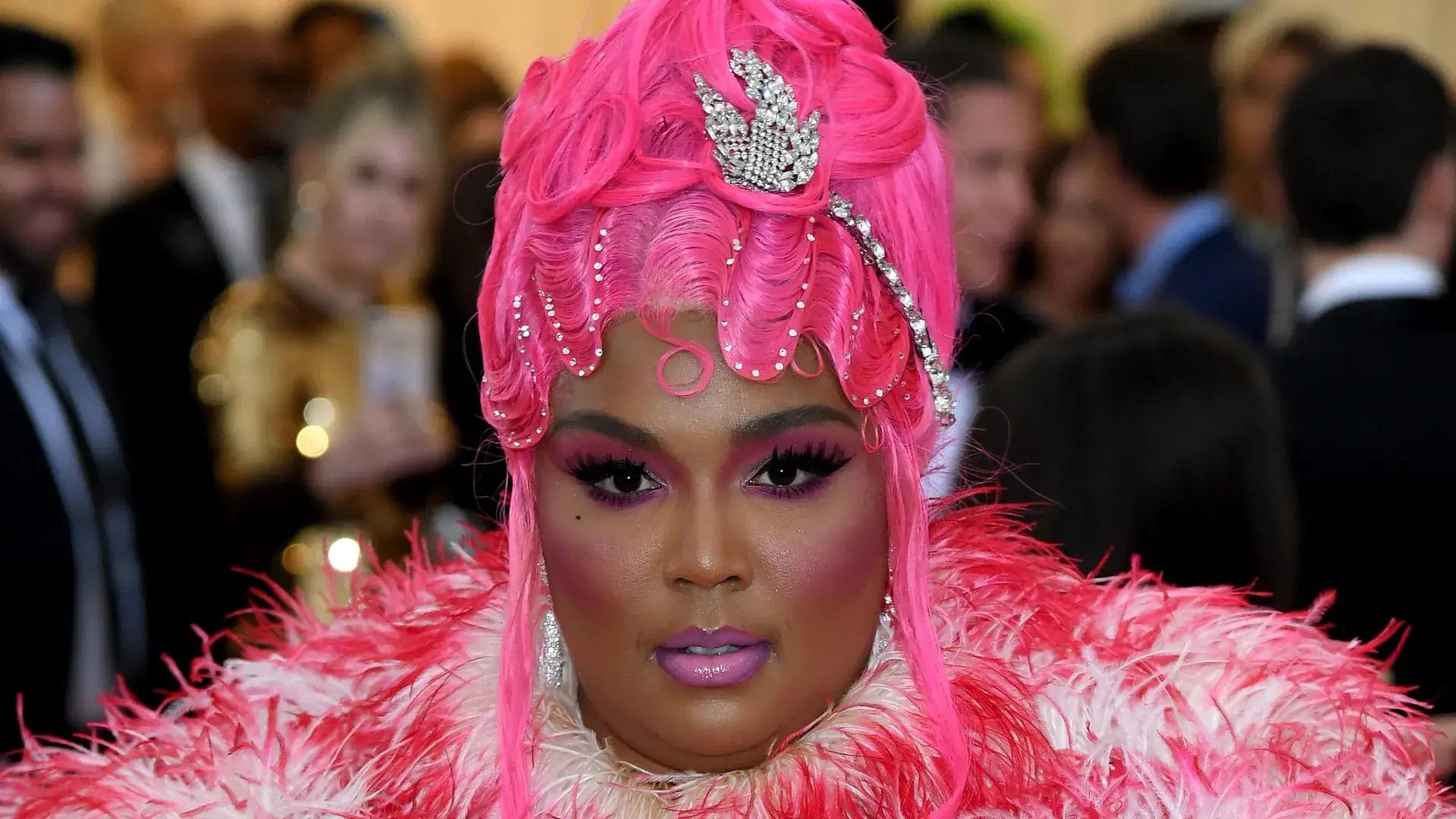 Image may contain Human Person Face Festival Crowd Clothing Apparel Suit Coat and Overcoat. Met Gala 2025 confirmed celebrities